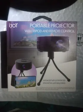 8003281 Ijoy Portable Projector With Tripod And Remote Control New Sealed Box