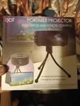 Ijoy Portable Projector With Tripod And Remote Control New. Price: $23.99.
